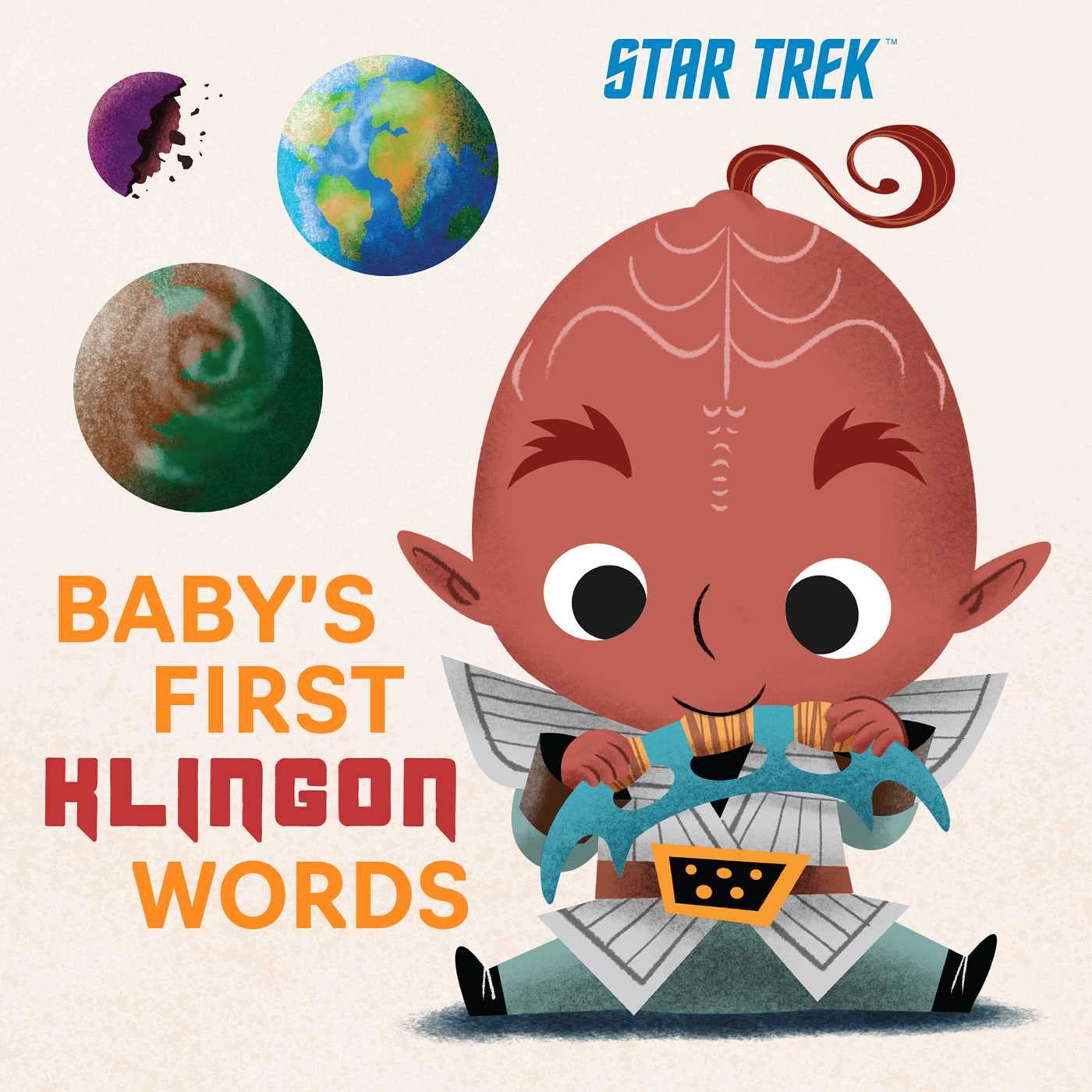 A cartoon baby in Klingon armor holding a toy phaser is depicted on Babys First Klingon Words, a charming book for young Starfleet fans. The cover features planets and the Star Trek logo, making it an engaging introduction to language comprehension.