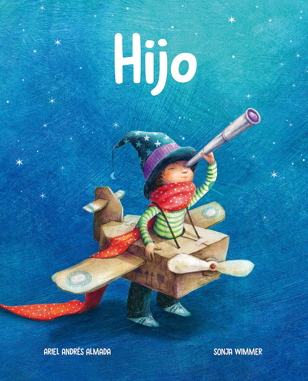A child stands on a blue surface, wearing a colorful hat and red scarf. Holding a telescope and donning a cardboard airplane, they gaze at the starry sky. Text reads Hijo (Son) by Ariel Andrés Almada and Sonja Wimmer, capturing the essence of parents love.