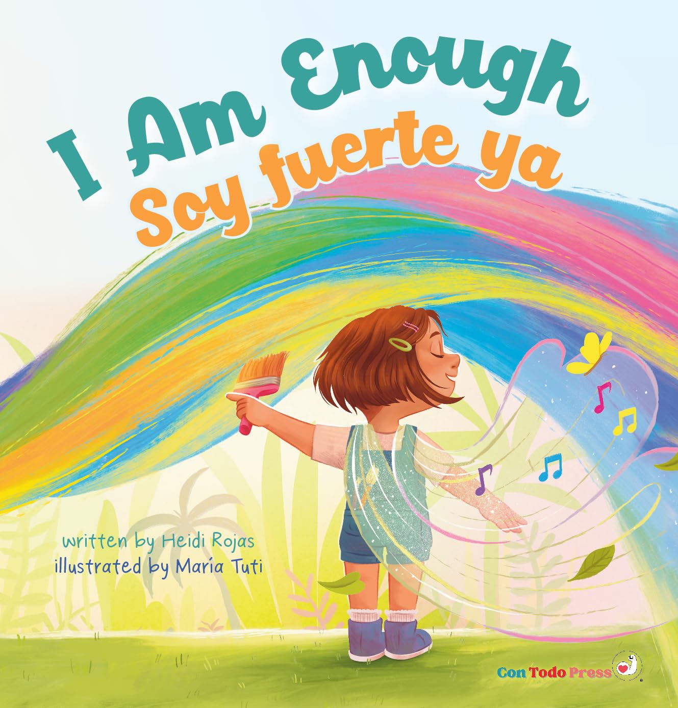 The vibrant cover of I am Enough / Soy fuerte ya shows a child painting a rainbow amid musical notes. This bilingual book by Heidi Rojas, illustrated by Maria Tuti and published by Con Todo Press, explores self-discovery and empowerment themes.