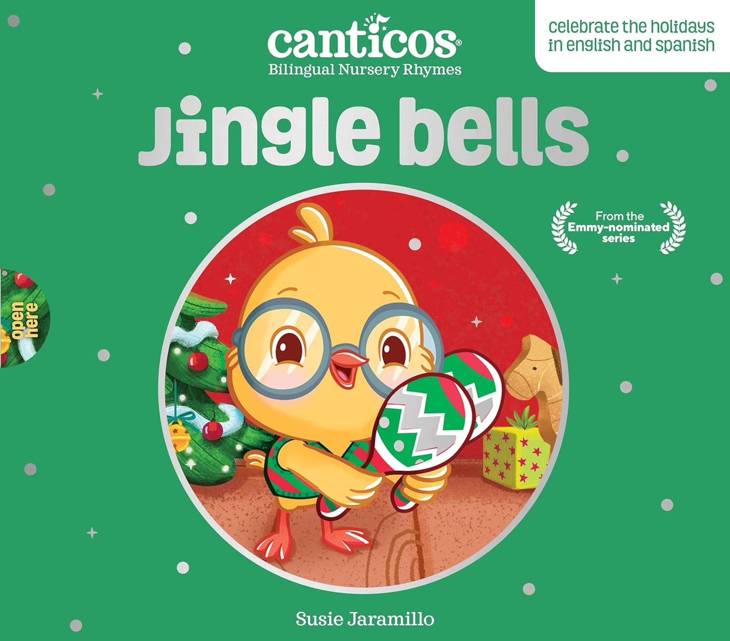 Jingle Bells / Navidad: Bilingual Nursery Rhymes features a glasses-wearing cartoon chick shaking maracas next to a festive tree and gifts, brought to you by Susie Jaramillo from the Canticos series.