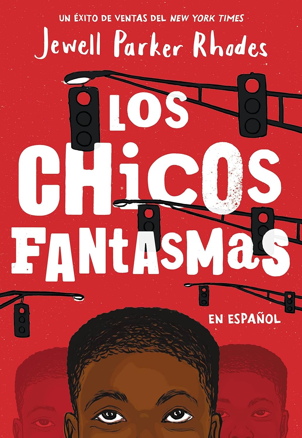 The image showcases the Spanish cover for Los Chicos Fantasmas (Ghost Boys Spanish Edition) by Jewell Parker Rhodes, set against a red background with silhouetted traffic lights and Jeromes partial face. A New York Times bestseller, this gripping tale blends ghostly encounters with poignant themes.
