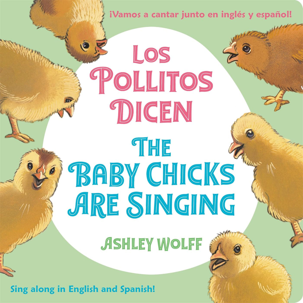 Book titled The Baby Chicks Are Singing/Los Pollitos Dicen by Ashley Wolff features illustrations of yellow chicks and a white circle. It includes bilingual text in Spanish and English, creating an ideal singalong for language learners.