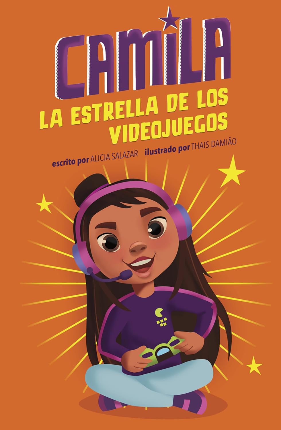 The Camila: La estrella de los videojuegos book cover features a young girl with long hair in gaming gear, confidently holding a controller. She smiles against an orange backdrop with yellow starbursts.