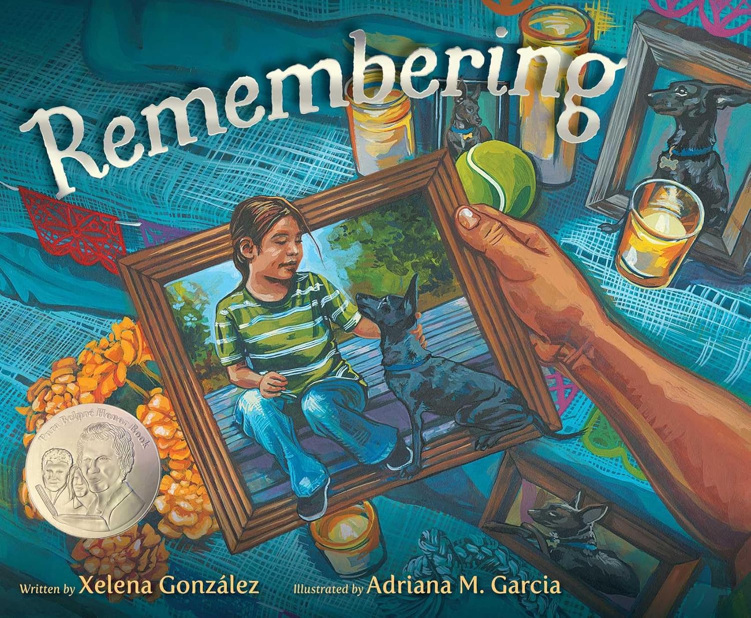 The book cover of Remembering by Xelena González and illustrated by Adriana M. Garcia depicts Día de los Angelitos with a painting of a person holding a framed photo of a girl and her dog, surrounded by an ofrenda with lit candles, marigolds, and vibrant colors.