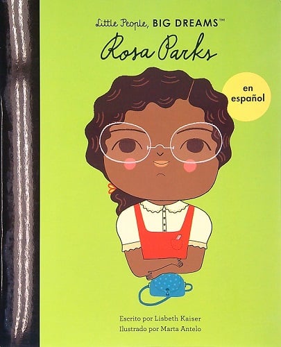 Cover of Rosa Parks en Español, featuring an illustration of the civil rights icon with glasses, a white shirt, red overalls, and a blue purse. Written by Lisbeth Kaiser and illustrated by Marta Antelo.