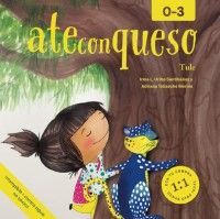 The image features the cover of Ate Con Queso, an enchanting libro infantil by Tule. A young girl with black hair hugs a blue and yellow-spotted animal under a tree. Embracing cultura mexicana, this book is ideal for ages 0-3, supporting desarrollo integral in early childhood.