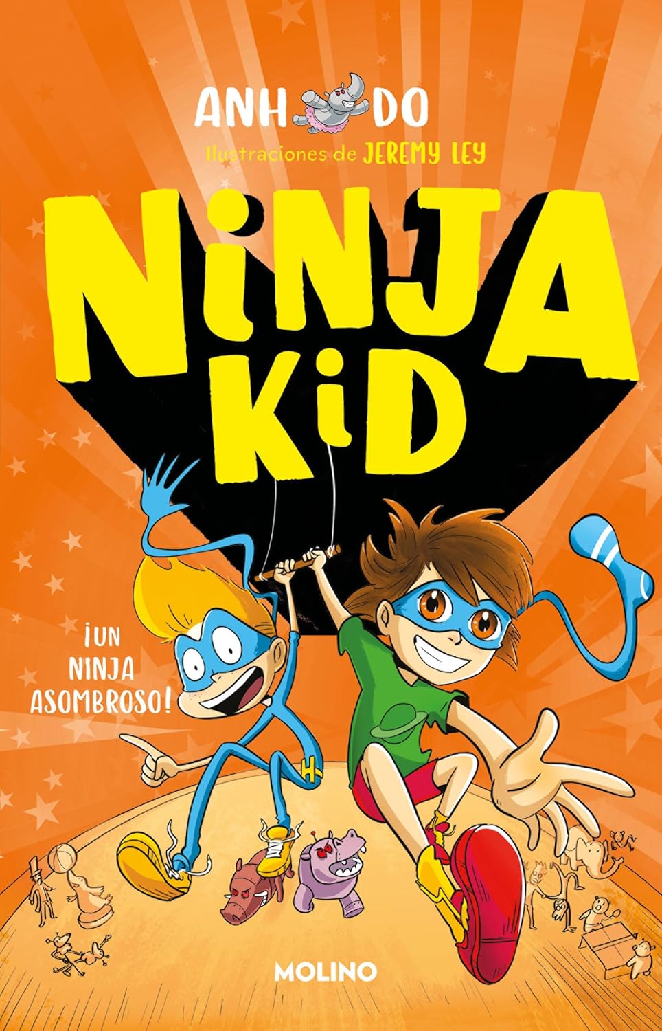 Cover of Un Ninja Asombroso / Amazing Ninja! by Anh Do, illustrated by Jeremy Ley. It depicts two cartoon characters: one with glasses and a green outfit, the other in blue with a headband, displaying ninja skills against an orange backdrop with doodles.