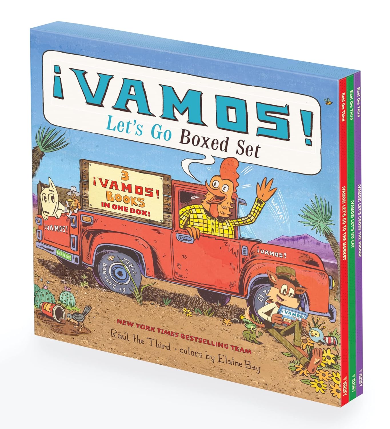 The Vamos! Lets Go Box Set cover depicts border town adventures with characters in a red truck amid a desert. Packed with vibrant, playful art, this bilingual set by Raúl the Third and colored by Elaine Bay comprises three stories ideal for learning Spanish.